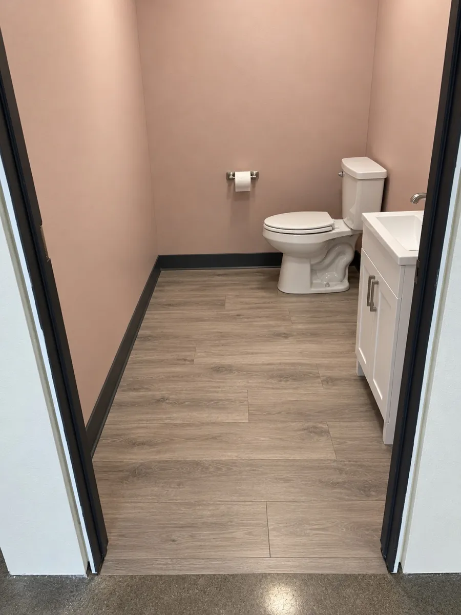 Second bathroom project after flooring and fixture installation