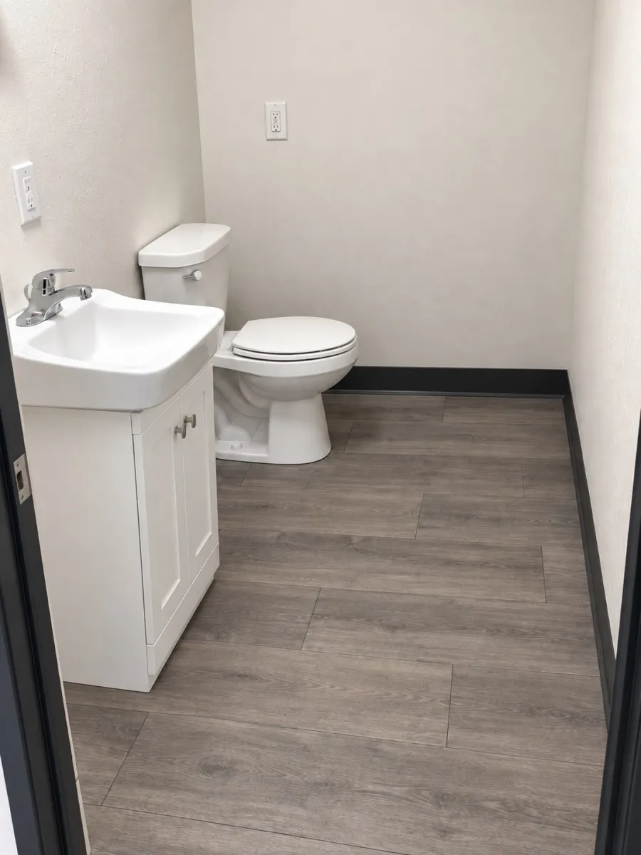 Bathroom project after new flooring and fixtures